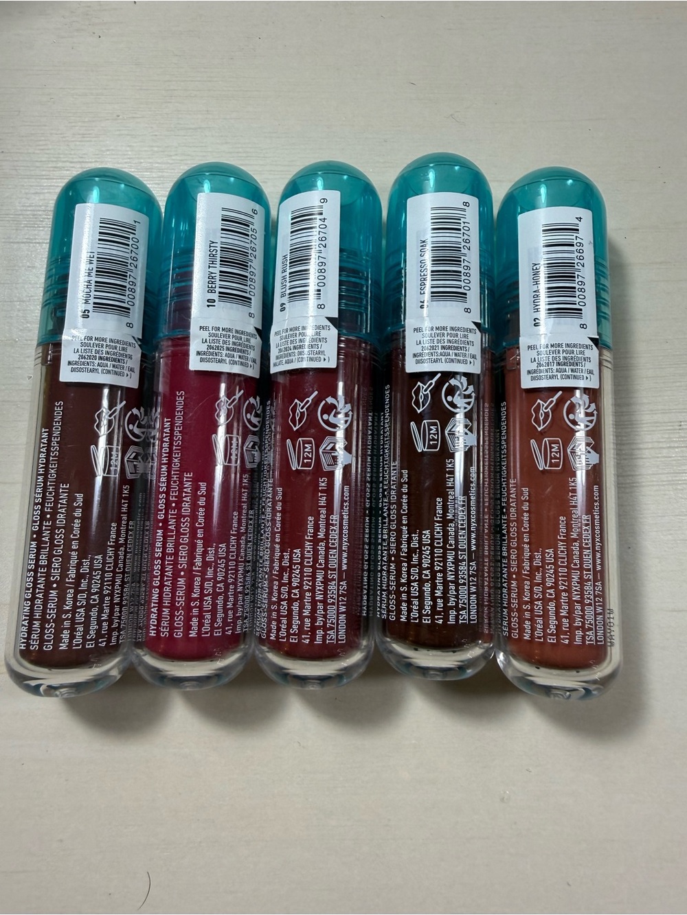 NYX Lip I.V. Hydrating Gloss Serum Set - Teal Caps with Berry, Red & Nude Shades - Picture 2 of 3